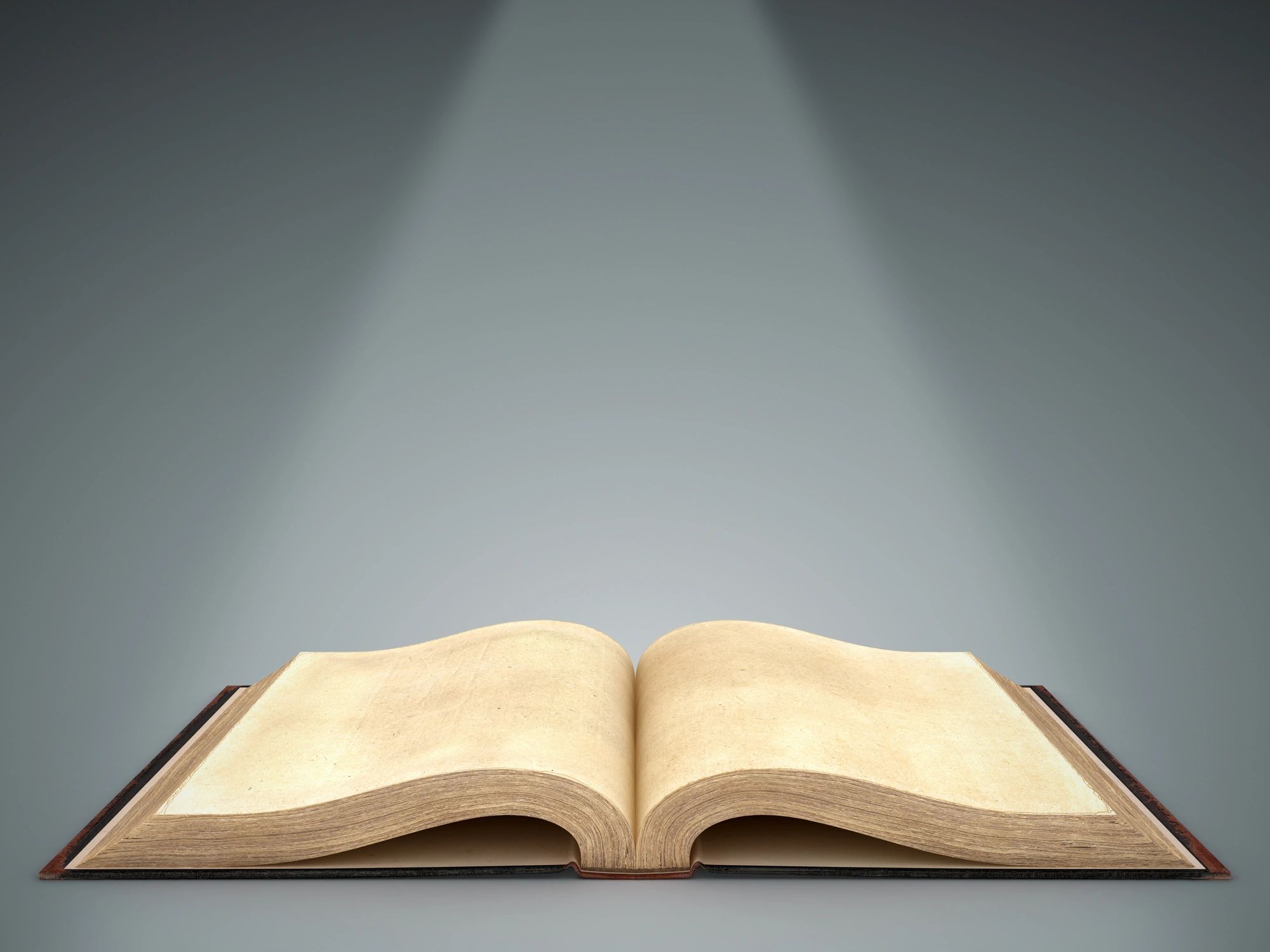 Open Bible on a dark background