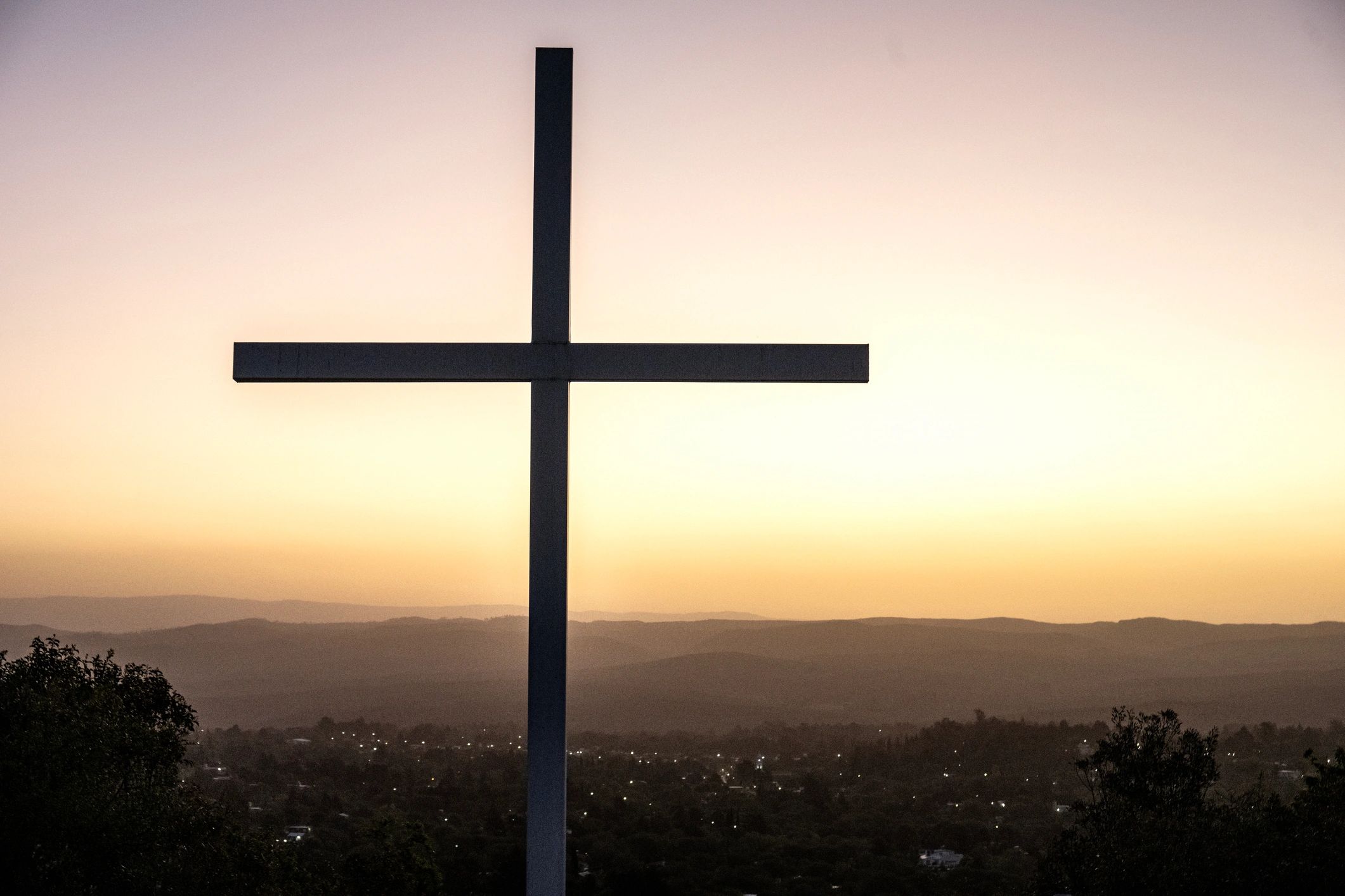Cross silhouette at dusk